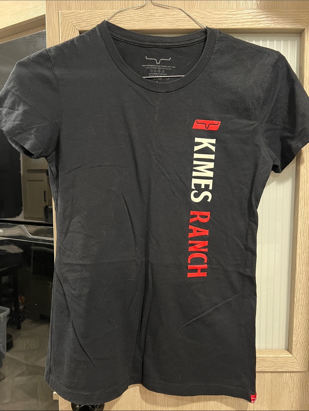 Kimes Ranch Black Tee with White and Red Vertical Logo